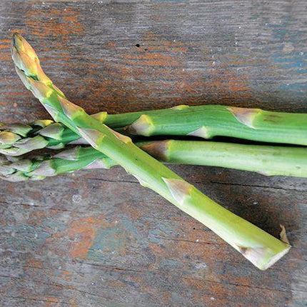 Green asparagus on a rustic wooden surface